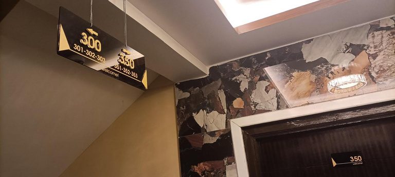 Hanging acrylic plate produced by Universal Enterprises